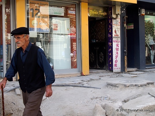 Bolu Man Walking On Sidewalk Construction